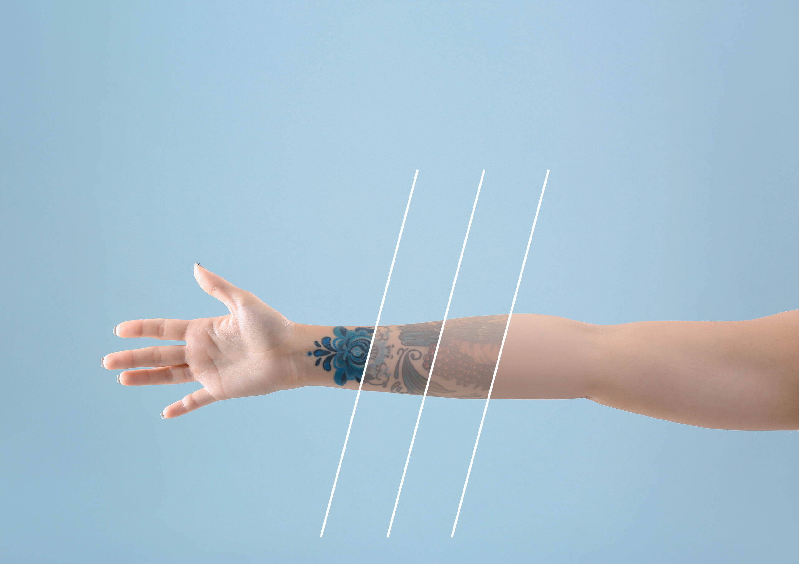 Female arm with tattoo on color background